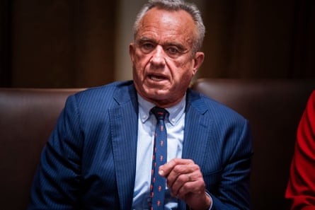 a man in a suit speaks