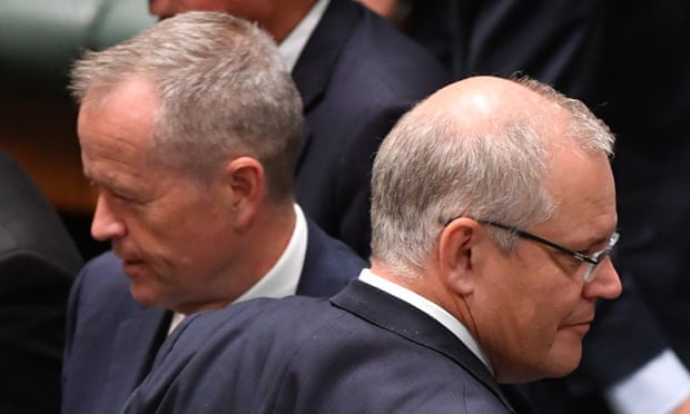 Bill Shorten and Scott Morrison cross paths during division in the House of Representatives