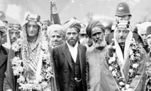 1935: The Crown Prince of Saudi Arabia (far left) on a visit to London’s Fazl mosque, the first purpose-built mosque in the capital.