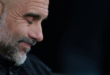 Manchester City manager Pep Guardiola closes his eyes.