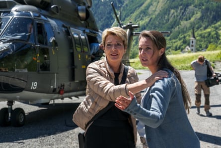 Karin Keller-Sutter and Franziska Biner beside a helicopter