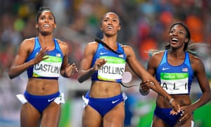 Brianna Rollins won ahead of her compatriots, second placed Nia Ali, right and Kristi Castlin, left.