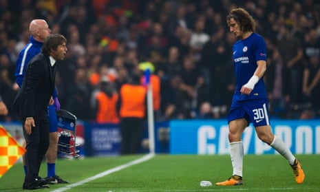 Antonio Conte has words with David Luiz after substituting his makeshift central midfielder in the Champions League draw with Roma.