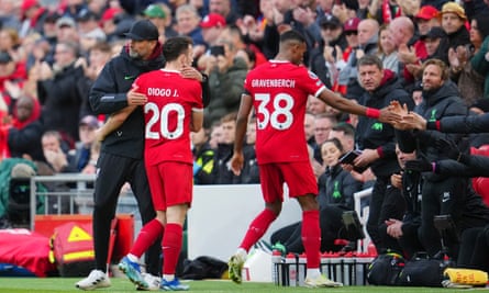Jürgen Klopp hugs Diogo Jota as he leaves the pitch during the between Liverpool and Nottingham Forest.