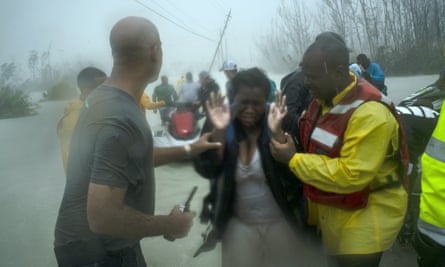 Volunteers rescue people from rising flood waters in Freeport, Grand Bahama