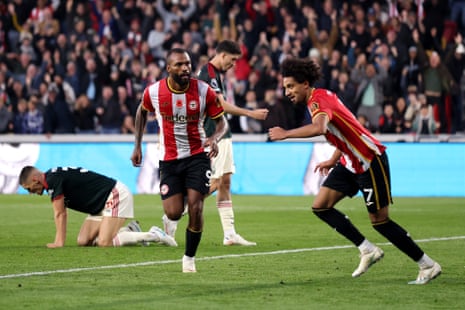 Igor Thiago celebrates scoring for Brentford as Kevin Schade runs to join him