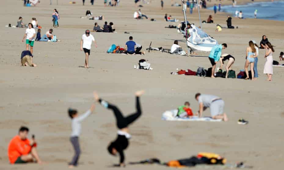 People on Malvarrosa beach in Valencia