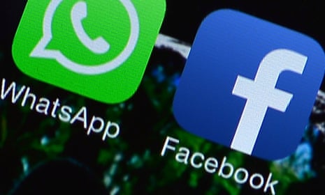 Facebook and WhatsApp applications' icons are displayed on a smartphone