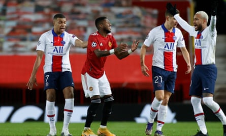 Manchester United's Fred (center) reacts after being sent off in the second half.