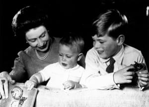 1965: Queen Elizabeth II plays with Princes Edward and Andrew at Windsor Castle
