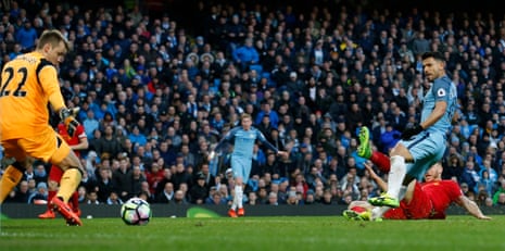Manchester City’s Sergio Aguero scores the equaliser against Liverpool to make the score 1-1