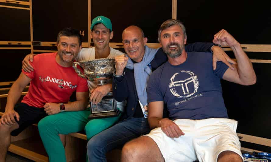 Novak Djokovic and his backroom team, including Goran Ivanisevic (right), celebrate after the match.