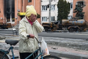 A woman cries when recalling the Russian occupation of the city of Borodyanka city near Kyiv, Ukraine.
