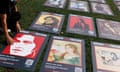 Protestors Carry Portraits Of Iranian Woman Mahsa Amini Through London On First Anniversary Of Her Death<br>LONDON, ENGLAND - SEPTEMBER 13: Images of people who have died in Iran are laid out ahead of a march through London ahead of the first anniversary of the death of Mahsa Amin, on September 13, 2023 in London, England. Protesters march through central London in memory of Mahsa Amini, a 22-year-old Iranian woman who died unexpectedly on September 16, 2022, in police custody in Iran after allegedly violating the country's hijab rules. Their demonstration pays tribute to both Mahsa Amini and the protesters in Iran who lost their lives fighting for justice following her tragic death.  (Photo by Dan Kitwood/Getty Images)