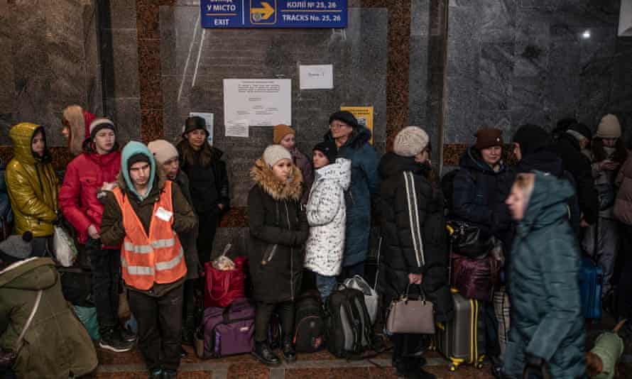 People queuing at Lviv train station.