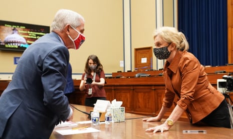 Dr Anthony Fauci talks with the New York congresswoman Carolyn Maloney on Capitol Hill on Friday.