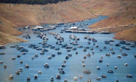 FILES-US-CLIMATE-ENVIRONMENT-DROUGHT<br>(FILES) In this file photo taken on May 25, 2021, houseboats are moored on Lake Oroville reservoir during the California drought emergency in Oroville, California. - Lakes at historically low levels, unusually early forest fires, restrictions on water use and now a potentially record heat wave: even before summer's start the US West is suffering the effects of chronic drought made worse by climate change. Eighty-eight percent of the West was in a state of drought this week, including the entire states of California, Oregon, Utah and Nevada, according to official data. (Photo by Patrick T. FALLON / AFP) (Photo by PATRICK T. FALLON/AFP via Getty Images)