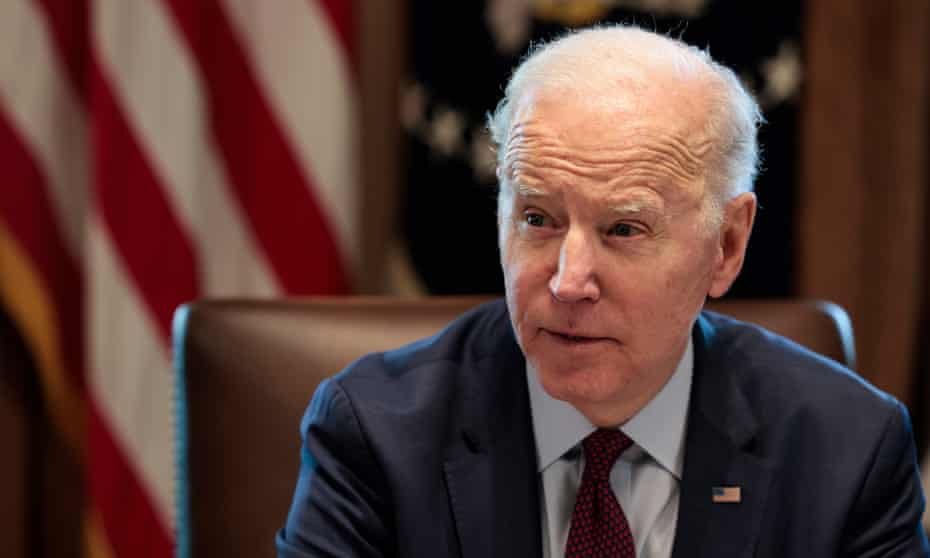 Biden talks to reporters before a cabinet meeting at the White House on Tuesday.