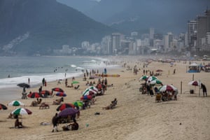 People visit Ipanema beach, a place that normally would be full of people during the carnival season, in Rio de Janeiro, Brazil, 13 February 2021. The city of Rio also cancelled all carnival parties and parades of samba schools.