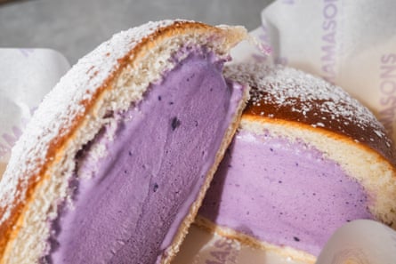 Frosted bun containing purple ice-cream.
