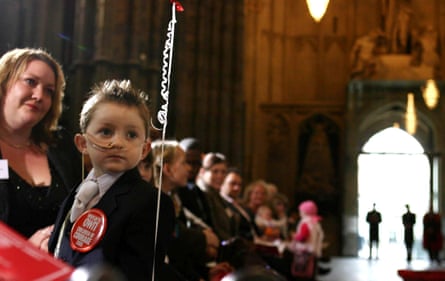 A little boy and his mother at an awards ceremony