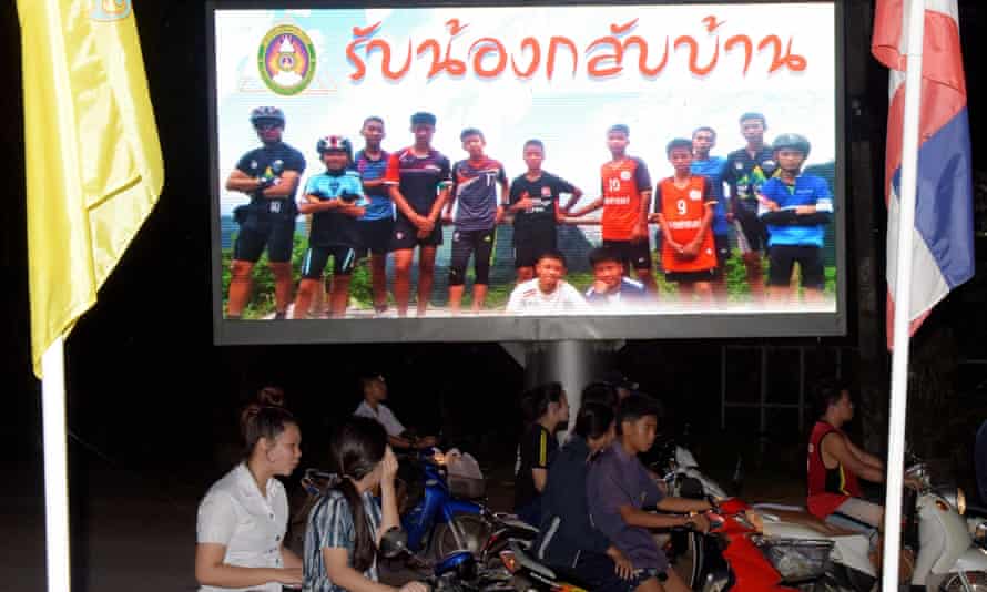A billboard in Chiang Rai displaying a photograph of the Wild Boars players and their coach with a message reading ‘welcome home brothers’.