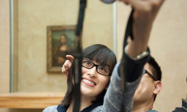 Snap happy in the Louvre.