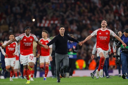 Noni Madueke, Mikel Arteta and Declan Rice run towards the fans after Arsenal’s semi-final victory.