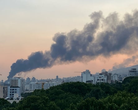 Smoke billows from an explosion at the Islamic Republic of Iran Broadcasting (IRIB) building in Tehran