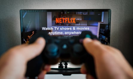 A TV viewer watches Netflix