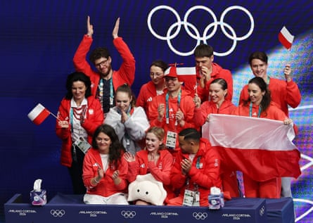 Ekaterina Kurakova with the Poland team (and her mascot).