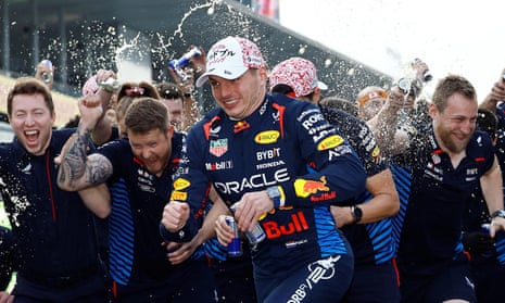 Red Bull's Max Verstappen celebrates with his team after winning the Japanese Grand Prix.