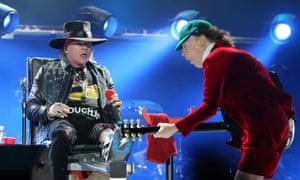 Whole Lotta Rosey … Axl Rose and Angus Young onstage in Lisbon