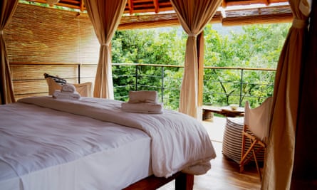 A bedroom in one of the Living Heritage Koslanda's forest pavilions.