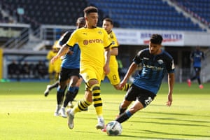 Dortmund’s English midfielder Jadon Sancho vies with Paderborn’s Tunisian defender Mohamed Drager.