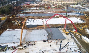 Hundreds of construction workers build the new Huoshenshan hospital in Wuhan.