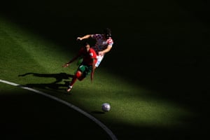Players from Morocco and Croatia underneath raking sunlight at Al Bayt Stadium
