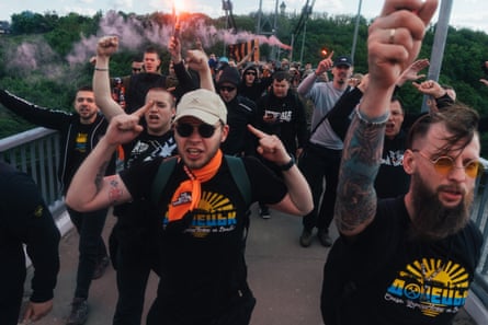 Shakhtar team fans cross a footbridge on their way to the Ukrainian Cup final in Zhytomyr.