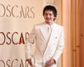 Timothée Chalamet wearing a white suit at the 98th Academy Awards