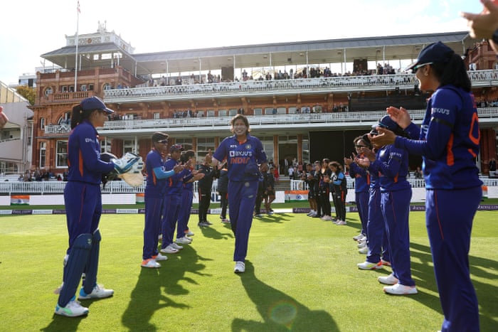 India players and umpires form a Guard of Honour for Jhulan Goswani of India on her final international match.