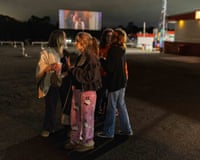 A group of teenagers at the drive-in cinema