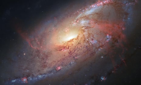 Galaxy M106 photographed by the Hubble telescope.