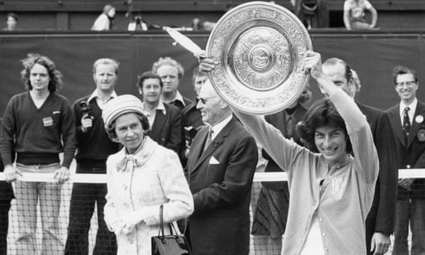 Reign stops play for the Queen, who spent much of her 96 years around big sport | Sport 1 The Queen looks on as Virginia Wade lifts the Wimbledon trophy in 1977.