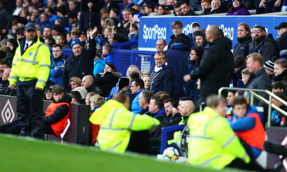 An Everton supporter sarcastically waves in the direction of Ronaldo Koeman during Everton’s 5-2 defeat to Arsenal at the weekend, which led to the Dutchman being sacked as manager
