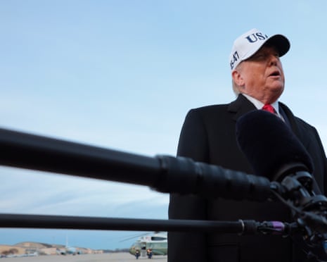 Donald Trump speaks to the media after exiting Air Force One.