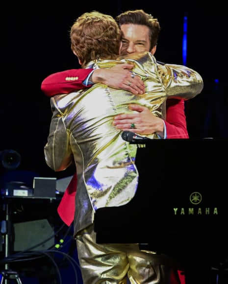 A fond farewell … Elton John and Brandon Flowers.