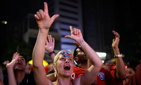 Supporters of Brazil's former president and current candidate Luiz Inácio Lula da Silva react as the current candidate is declared victorious.
