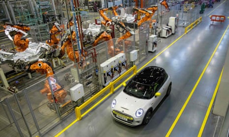 A Mini Electric car next to the production line at the BMW plant in Cowley, near Oxford.