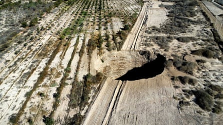 A sinkhole is exposed at a mining zone close to Tierra Amarilla town, in Copiapo, Chile.