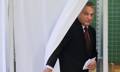 Hungarian prime minister Viktor Orbán exits a voting cabin after casting his ballot in the referendum in Budapest.